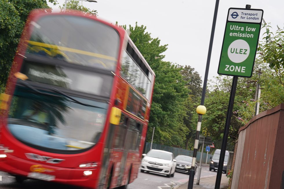 Ulez sign and London bus