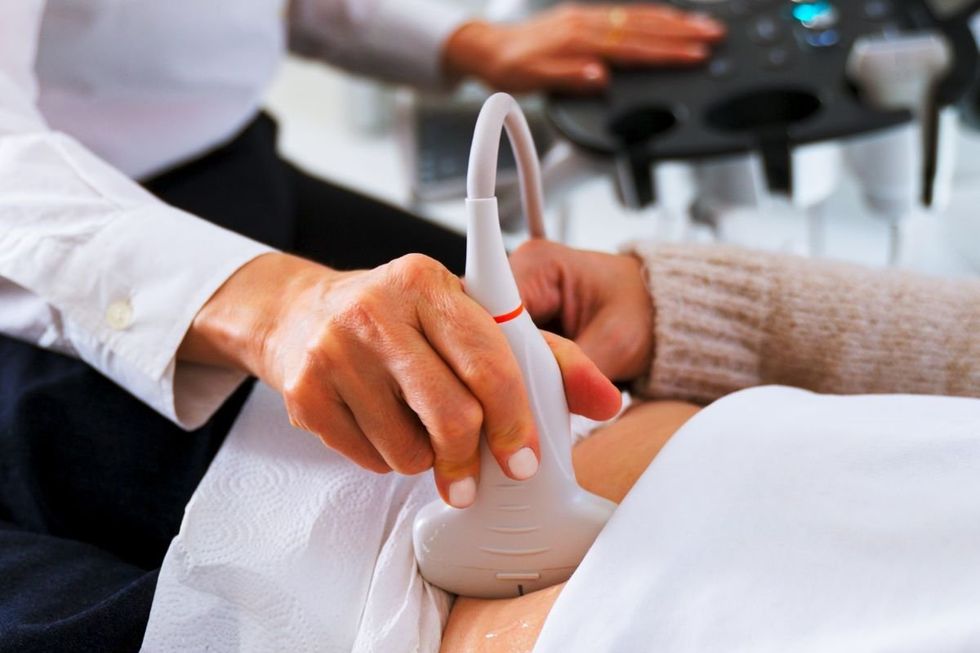 ULTRASOUND SCAN ON WOMAN