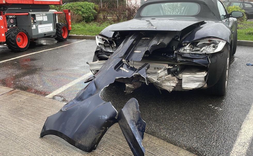 Undated handout photo from the Twitter feed of @SurreyRoadCops of a car after a motorist had driven for more than 30 miles with the rear end of his vehicle hanging off after crashing his Porsche on the M25 in Kent.
