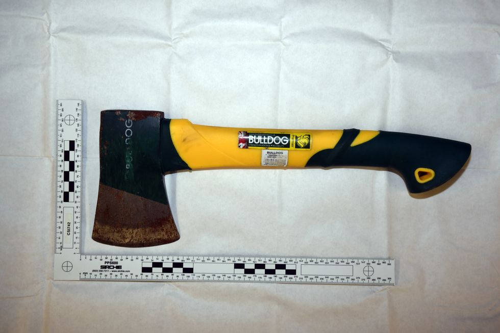 Undated handout photo issued by Lancashire Constabulary of the axe used in the murder. Andrew Burfield, 51, has pleaded guilty on the third day of his trial at Preston Crown Court to the murder of Katie Kenyon, 33, whose body was found in the Forest of Bowland, Lancashire, in April. Issue date: Wednesday November 16, 2022.