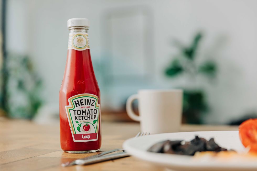 Undated handout photo issued by Loop of a Heinz Tomato ketchup bottle, one of the brands that already or will soon have products in fully reusable packaging which can be returned, cleaned and refilled through the scheme. A zero-waste shopping service is launching in the UK to allow people to buy products from laundry detergent to ketchup in refillable packaging.