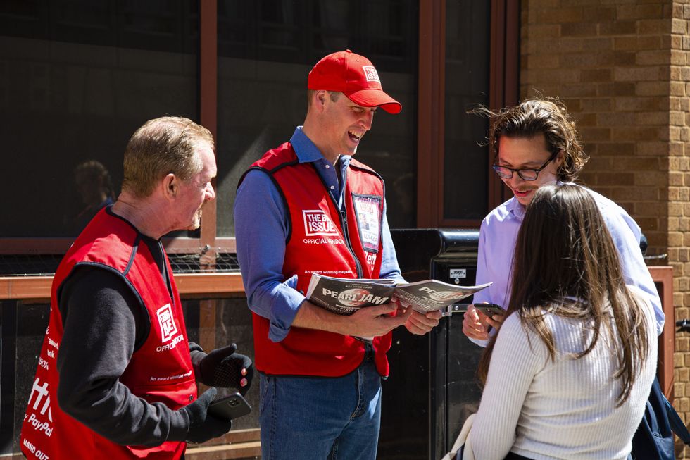 Undated handout photo issued by the Big Issue of the Duke of Cambridge (centre) selling the Big Issue in London with Big Issue vendor Dave Martin