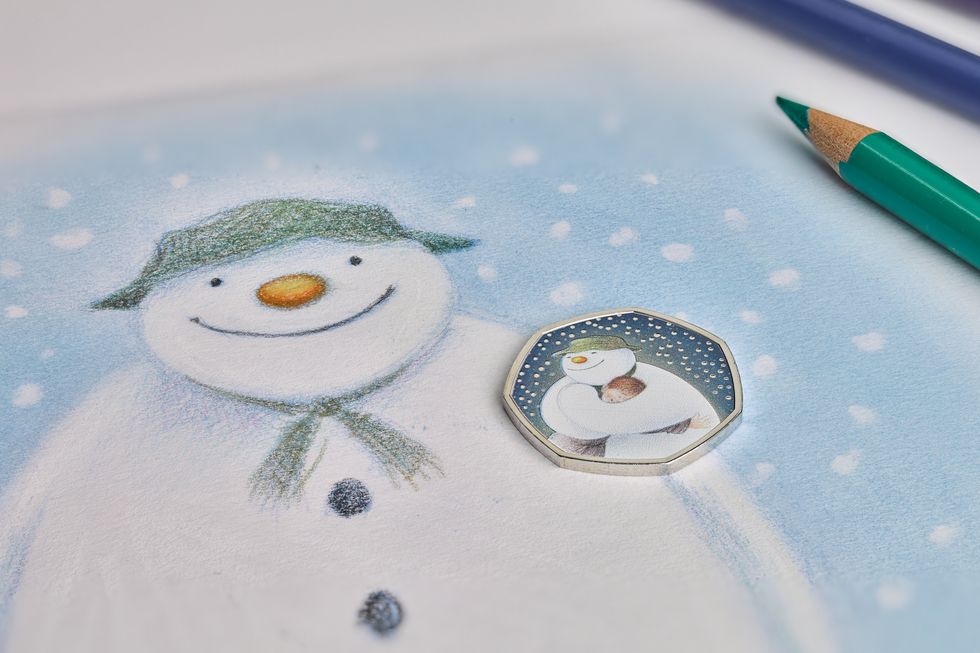 Undated handout photo issued by the Royal Mint of a new 50p coin released by the Royal Mint featuring The Snowman, the much-loved animation created by illustrator Raymond Briggs.