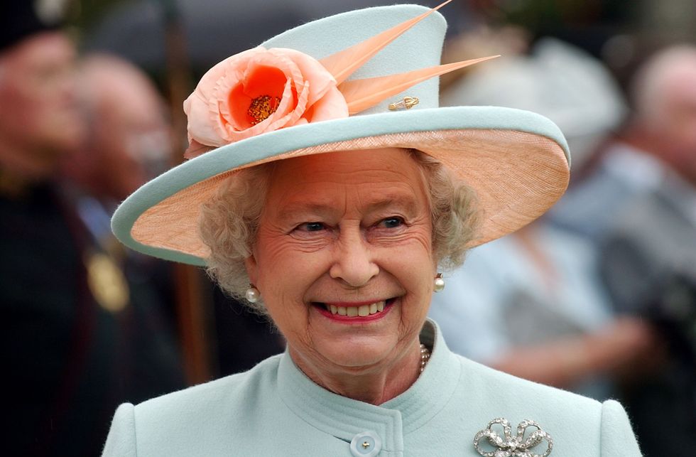Undated Handout Photo of Queen Elizabeth II attends a garden party for members of the public at Holyroodhouse in Edinburgh, to mark the occasion of her 80th birthday, landscape.See PA Feature BEAUTY Queen. Picture credit should read: PA Photo/Danny Lawson. WARNING: This picture must only be used to accompany PA Feature BEAUTY Queen.