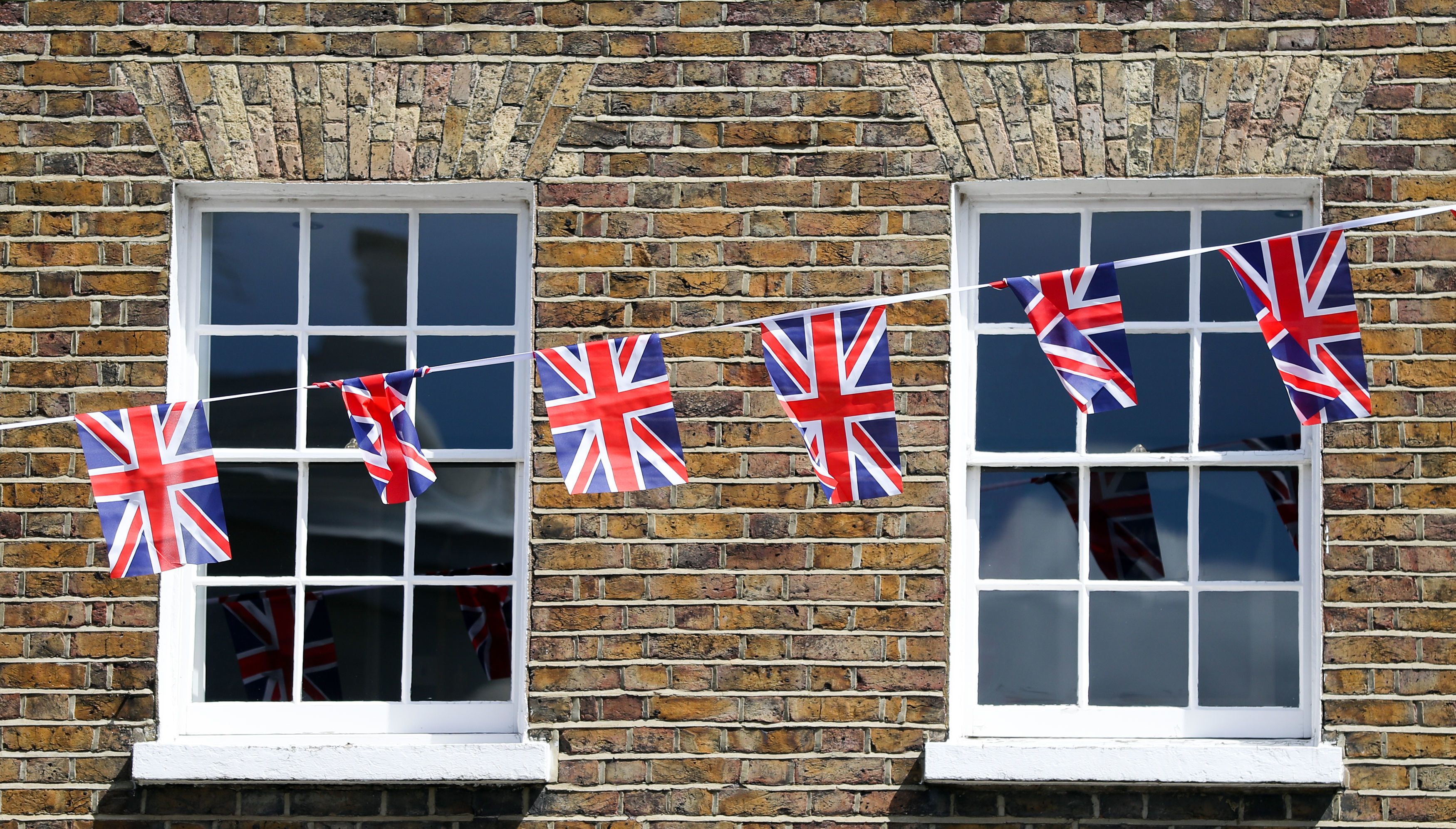 Union flag bunting is hung.
