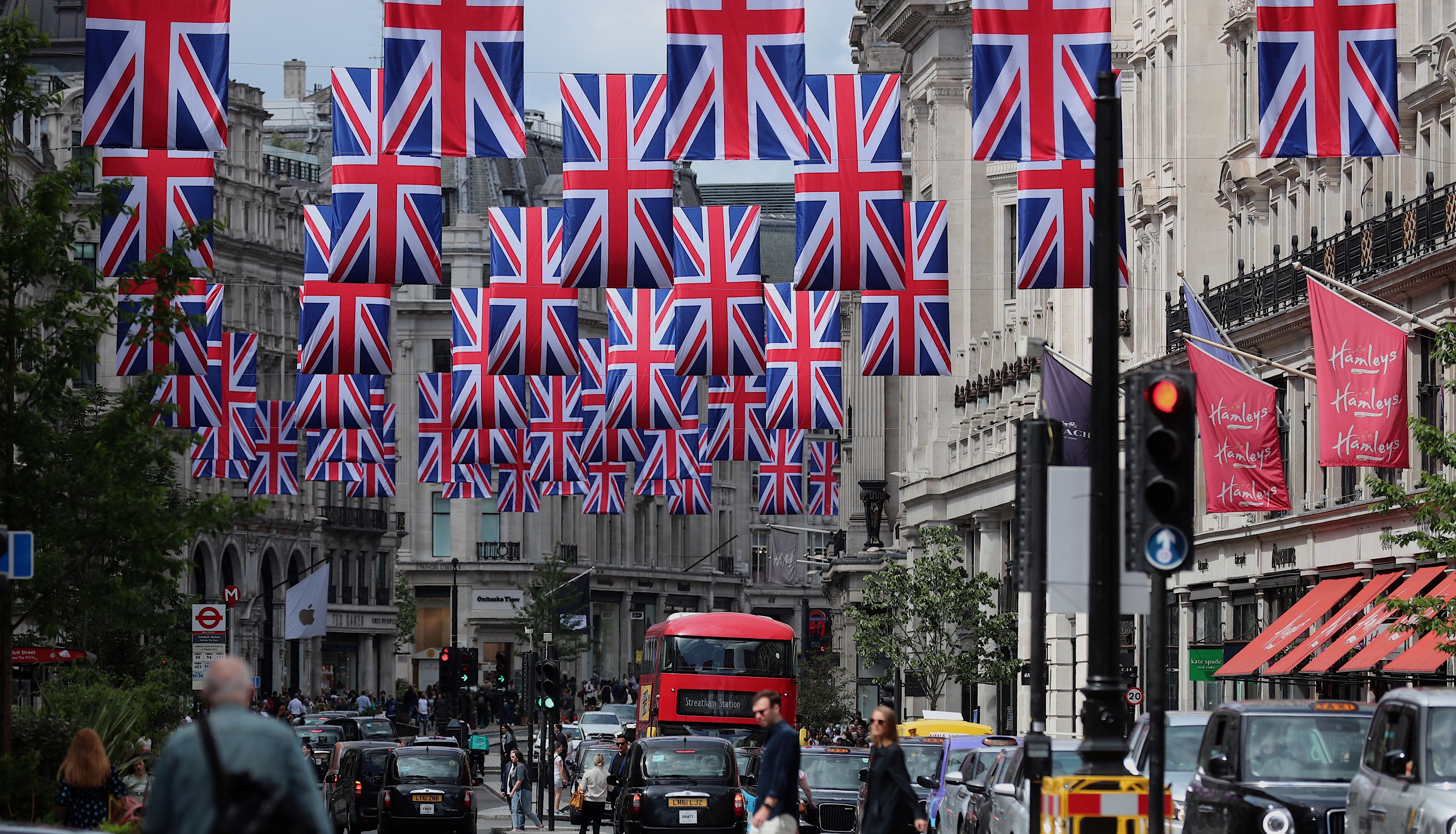 Union Jack flags hang above Regent Street ahead of planned celebrations for The Queen's Platinum Jubilee in London, Britain