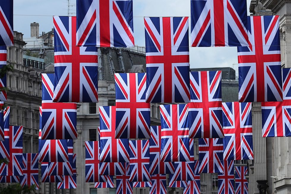 Union Jack flags hang above Regent Street ahead of planned celebrations for The Queen's Platinum Jubilee in London, Britain