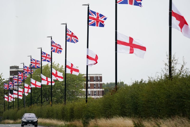 Union Jacks and St George's Crosses tied to street lights