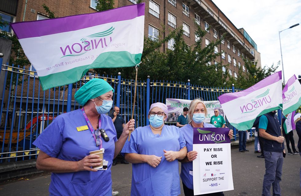 Unison members taking part in a protest outside the Royal Victoria Hospital in Belfast, as hundreds of thousands of health workers start voting on Thursday on whether to strike over pay.
