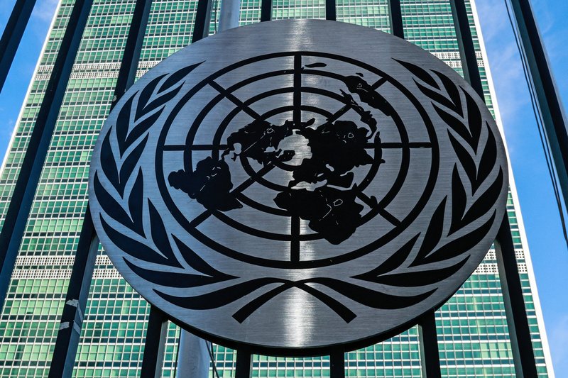United Natiosns symbol on a gate