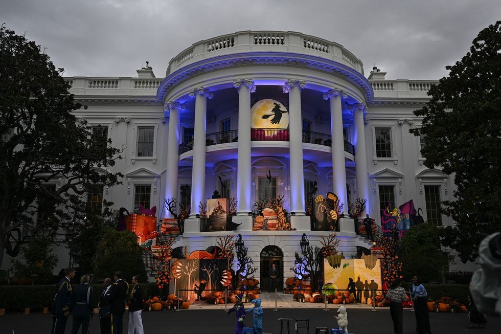 United States President Joe Biden and First Lady Jill Biden arrive to greet trick-or-treaters on the South Lawn of the White House