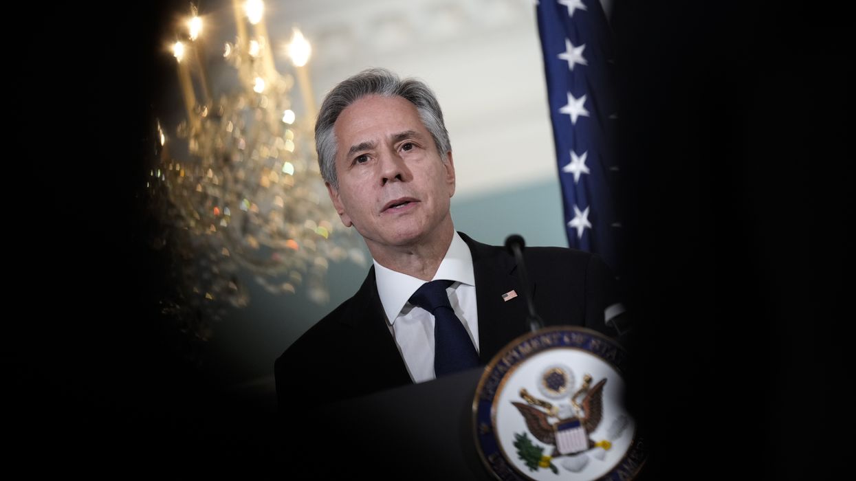 United States Secretary of State Antony Blinken is pictured standing behind a podium
