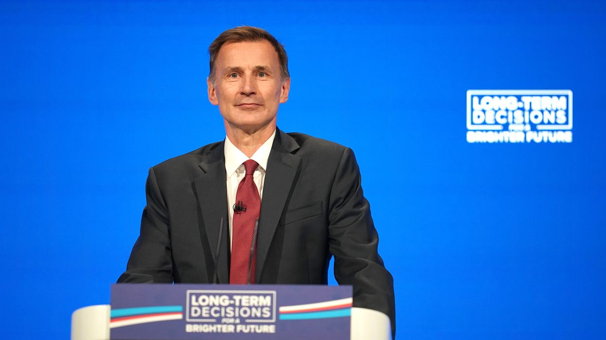 Universal Credit sign at Jobcentre Plus and Jeremy Hunt in pictures