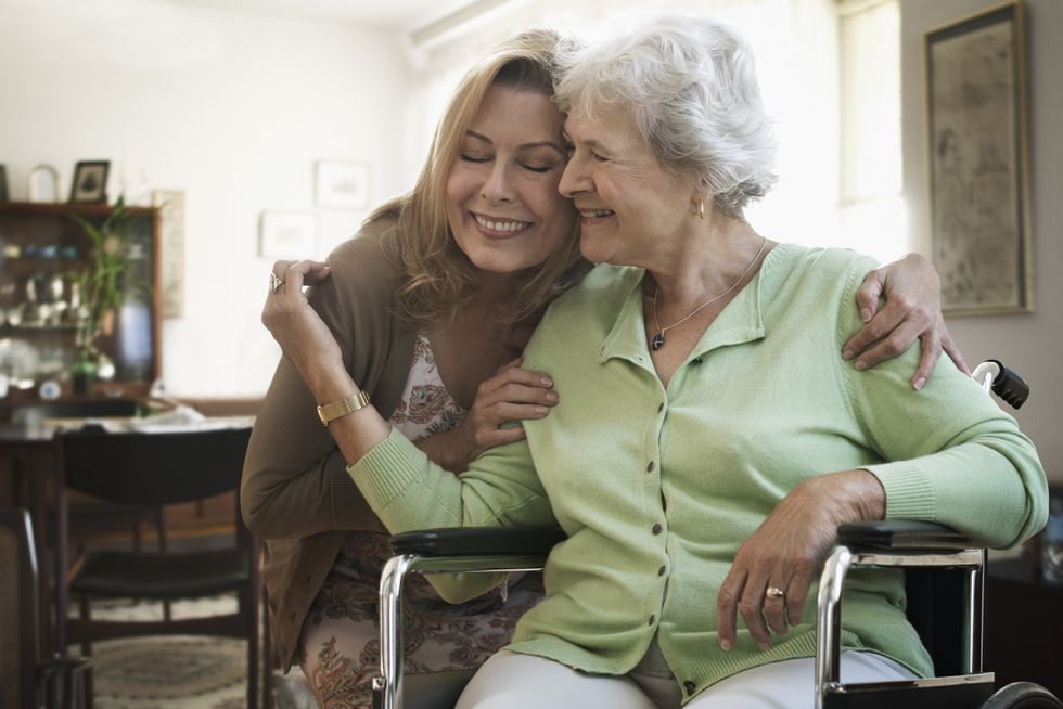 Unpaid carer with their elderly mother