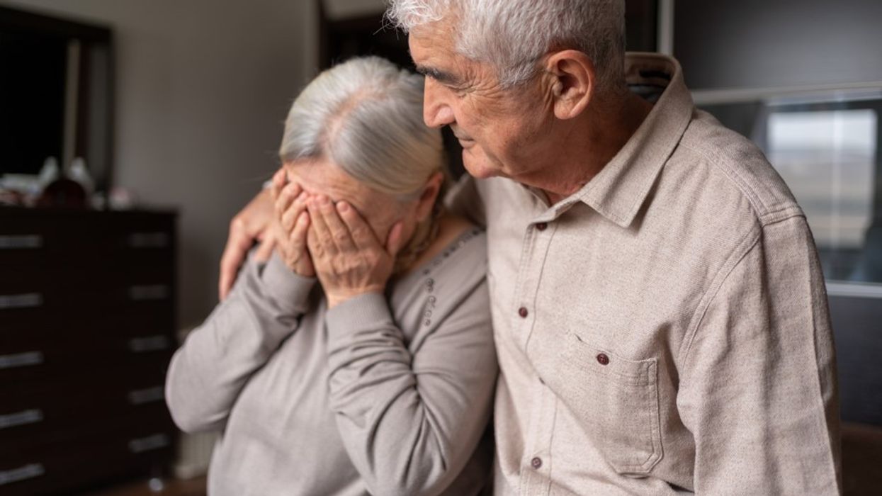 UPSET ELDERLY COUPLE