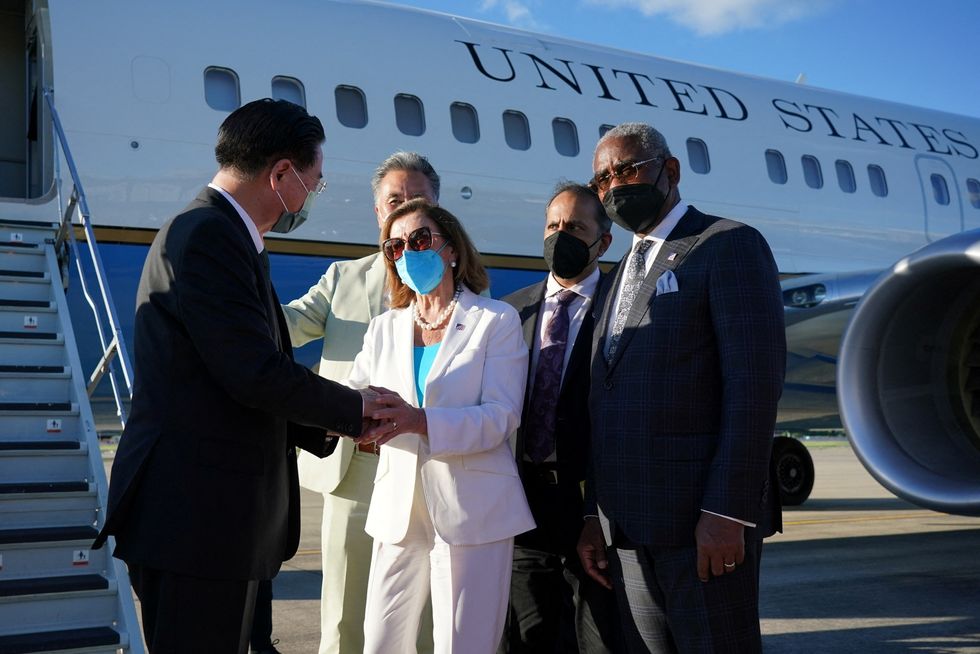 US House of Representatives Speaker Nancy Pelosi talks with Taiwan Foreign Minister Joseph Wu.