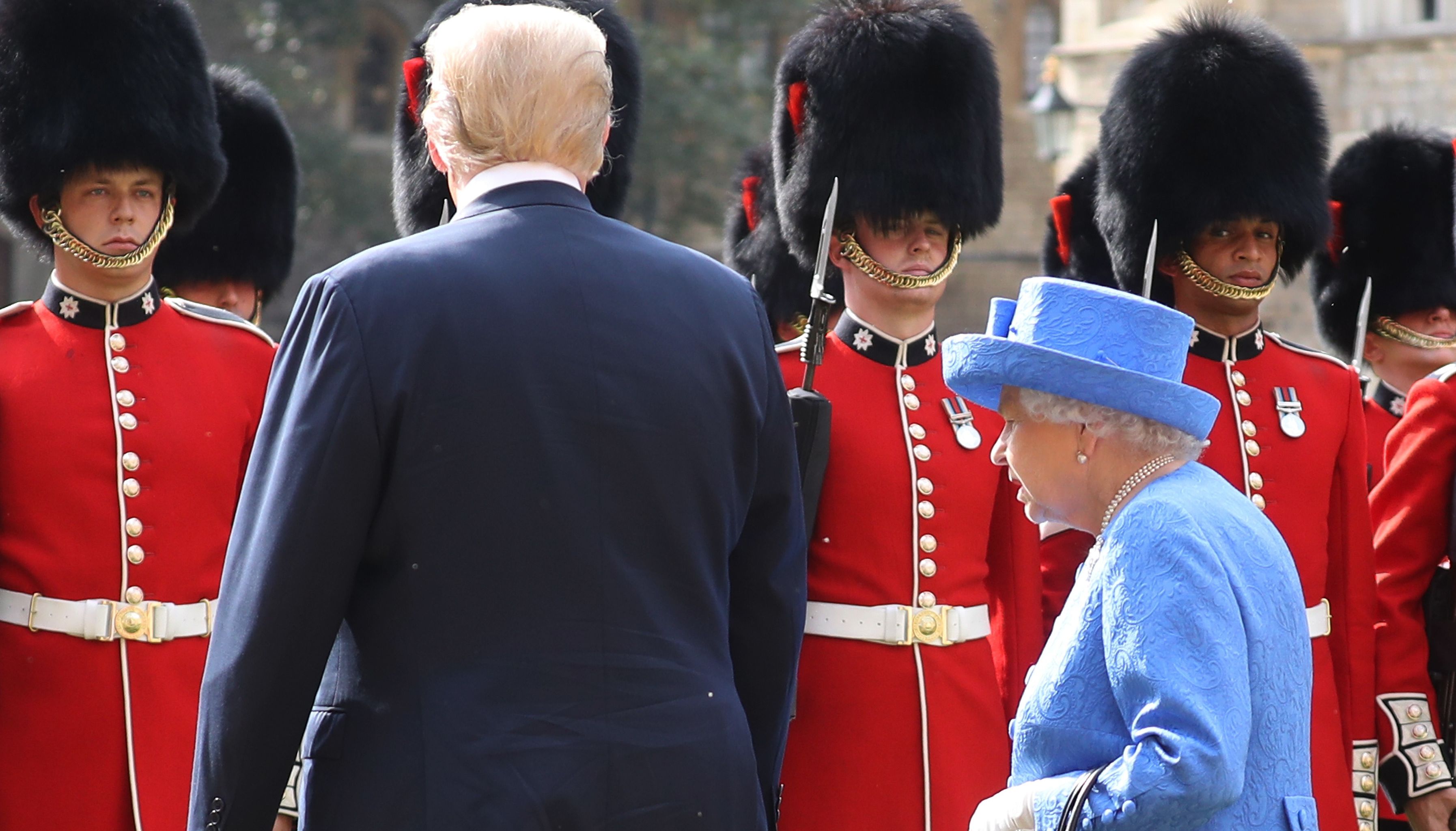 US President Donald Trump and Queen Elizabeth II inspect a Guard of Honour, formed of the Coldstream Guards, at Windsor Castle, Windsor.