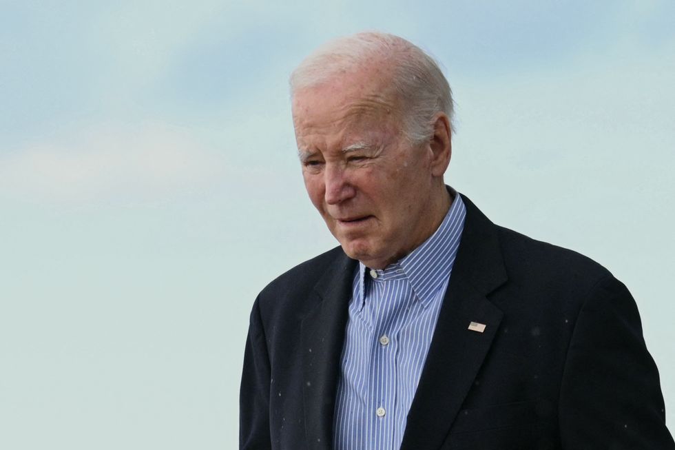 US President Joe Biden steps off Air Force One upon arrival at Henry E. Rohlsen Airport in Christiansted, Saint Croix