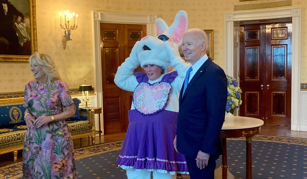 US President Joe Biden with adviser Meghan Hays, dressed as the Easter Bunny