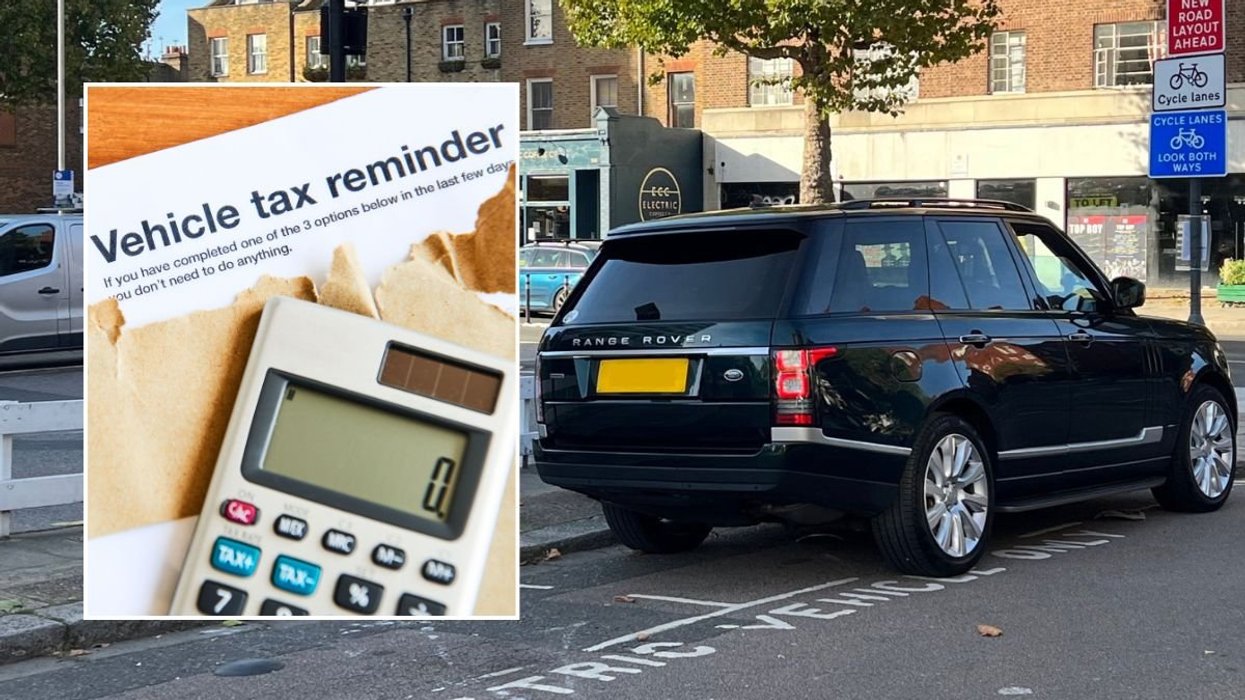 Vehicle tax reminder and a large SUV parked on a road