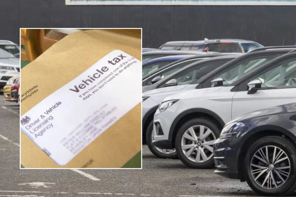 Vehicle tax reminder and cars parked in a