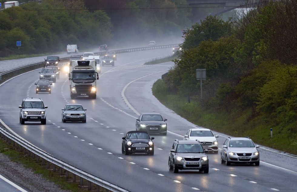 Vehicles travel along the M4 motorway near Bath