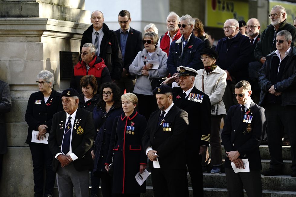 Veterans and members of the public attend an Armistice Day service in Portsmouth.