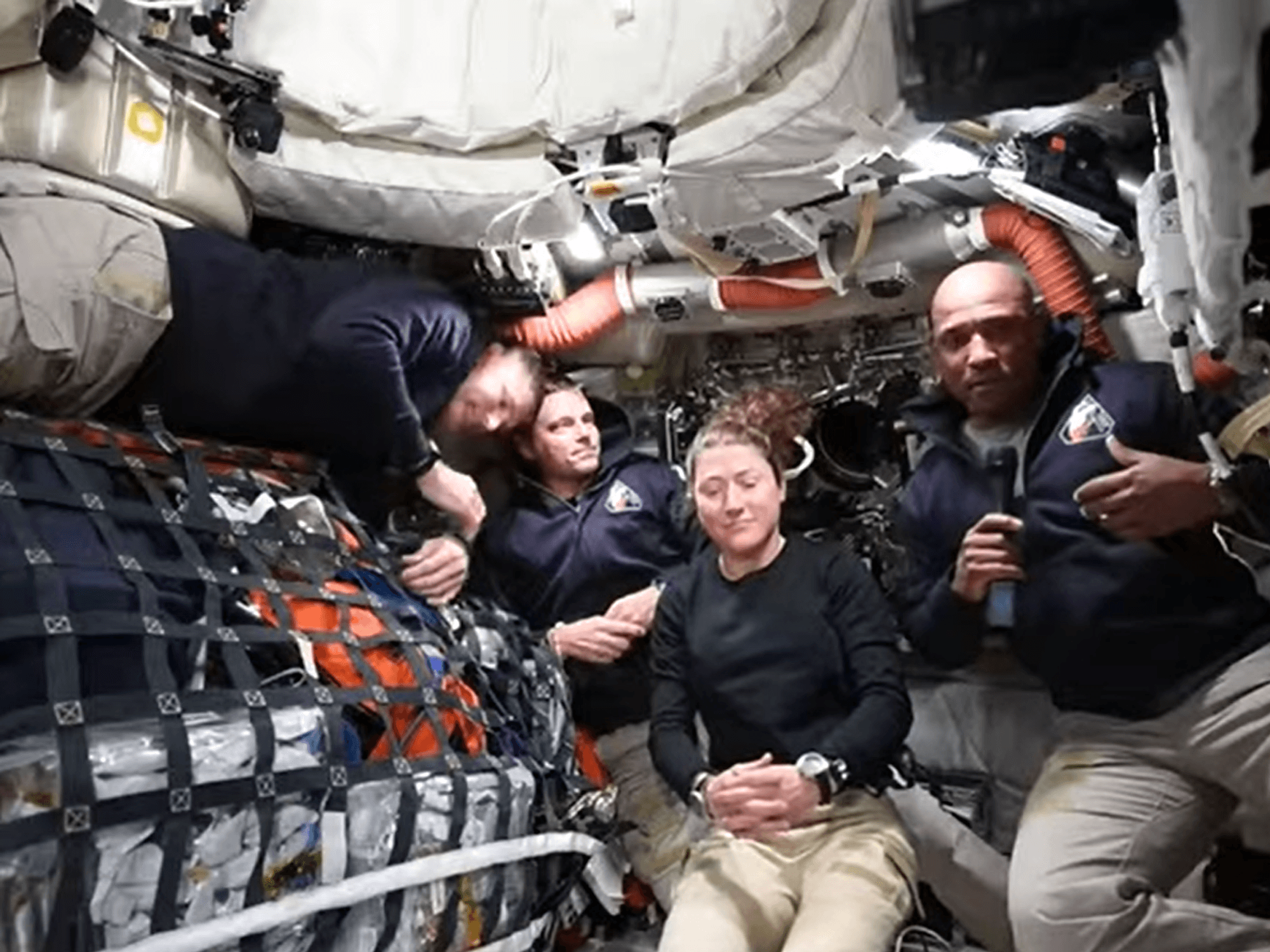 Victor Glover and Artemis II crew on Orion capsule