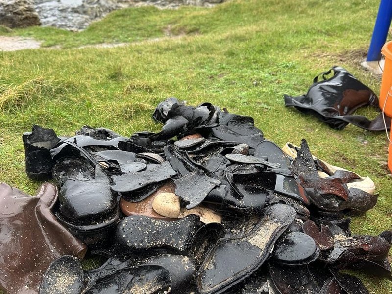 Wales news: Mystery as dozens of Victorian shoes wash up on British beach