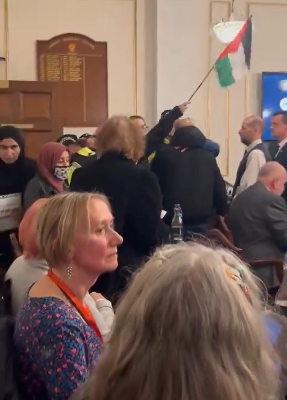 Video footage from the meeting in Chorley showed events take a turn after a Tory Councillor attempted to restore order