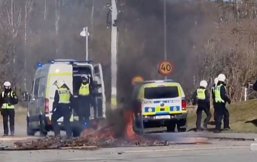 Video footage shows police attending the violent riots that have erupted across Sweden
