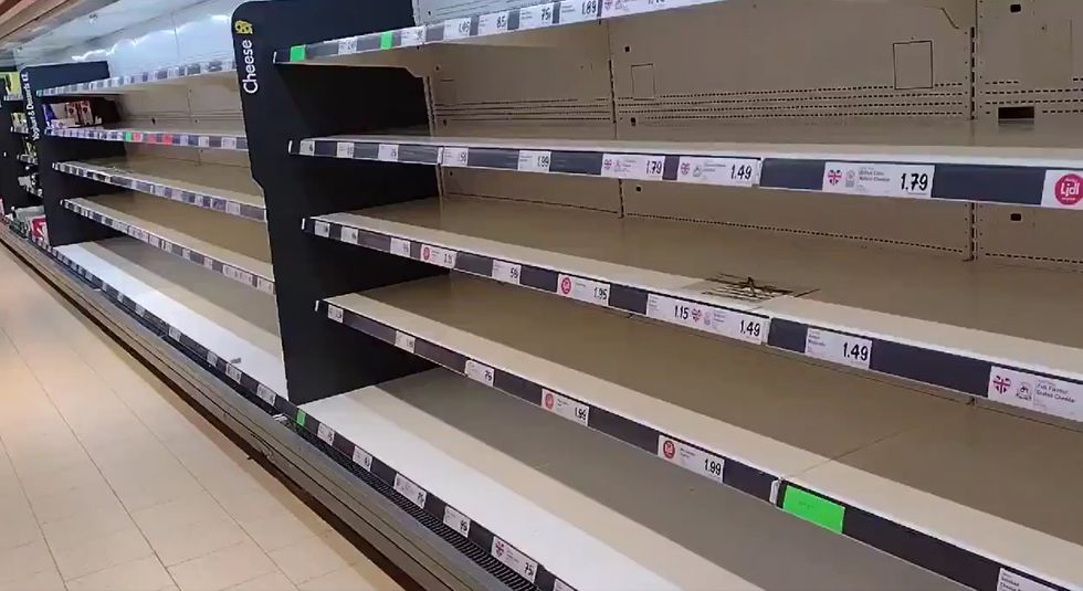 Video grab taken with permission from the Twitter feed of @Gramblera of empty shelves in Lidl in Wolverton, Milton Keynes. Deliveries to supermarkets and other businesses across the UK are facing a growing shortage of drivers with many self-isolating after being pinged by the NHS COVID app. Issue date: Thursday July 22, 2021.