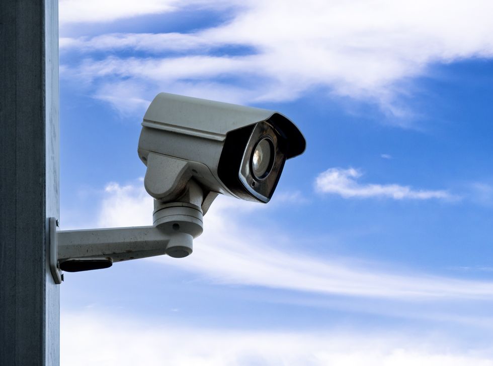 Video surveillance and security camera on the exterior of a house