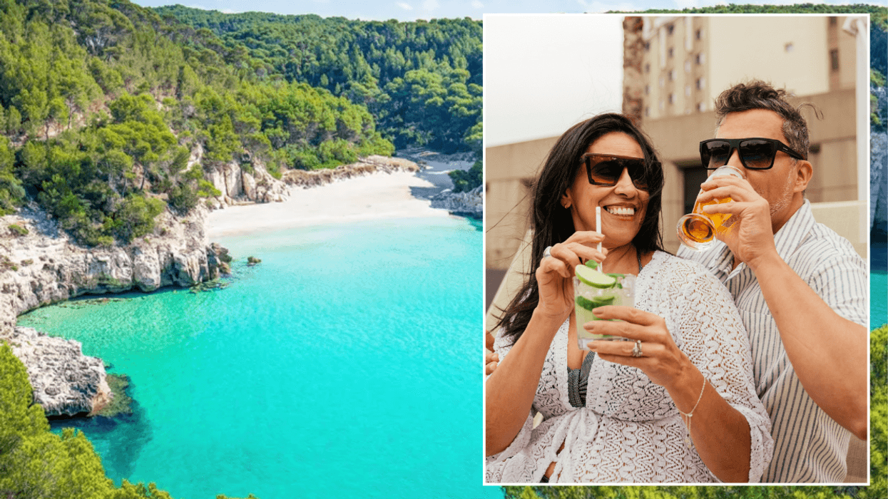 View of a bright, blue sea in Menorca / couple with cocktails