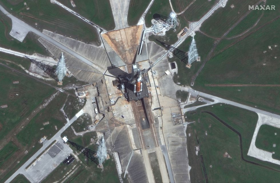 View of Launch Pad 39B showing NASA's SLS-Orion spacecraft for the Artemis I mission at Kennedy Space Center, Florida, U.S., August 25, 2022 in this handout satellite image. Maxar Technologies/Handout via REUTERS THIS IMAGE HAS BEEN SUPPLIED BY A THIRD PARTY. MANDATORY CREDIT. NO RESALES. NO ARCHIVES. MUST NOT OBSCURE LOGO