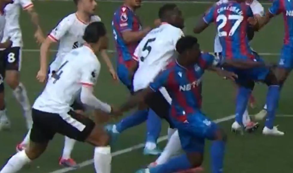 Virgil van Dijk held down Marc Guehi's arm