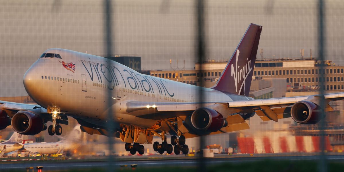 NextImg:Virgin flight descends into chaos after teenagers used fake ID to buy alcohol and get drunk on plane as police arrest them upon landing