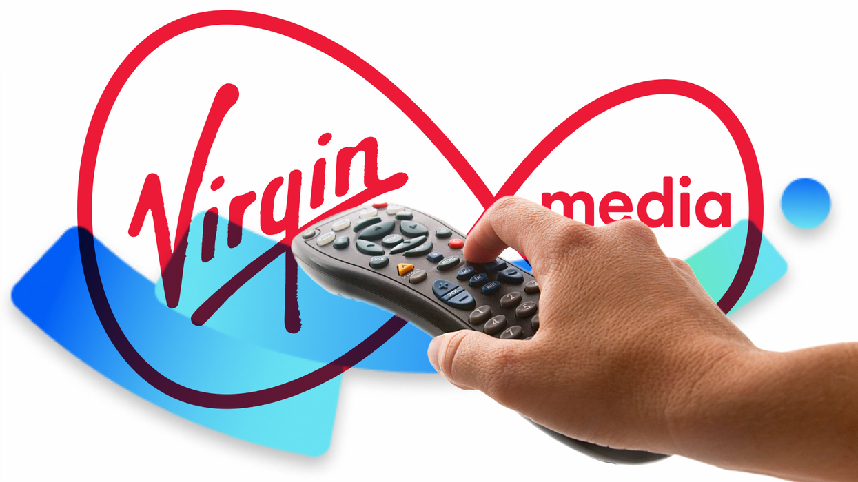Virgin Media logo behind TV remote