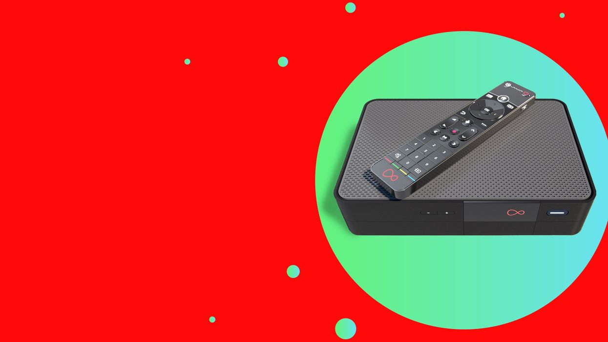 virgin media tv 360 box on a colourful green and red background with remote lying on-top