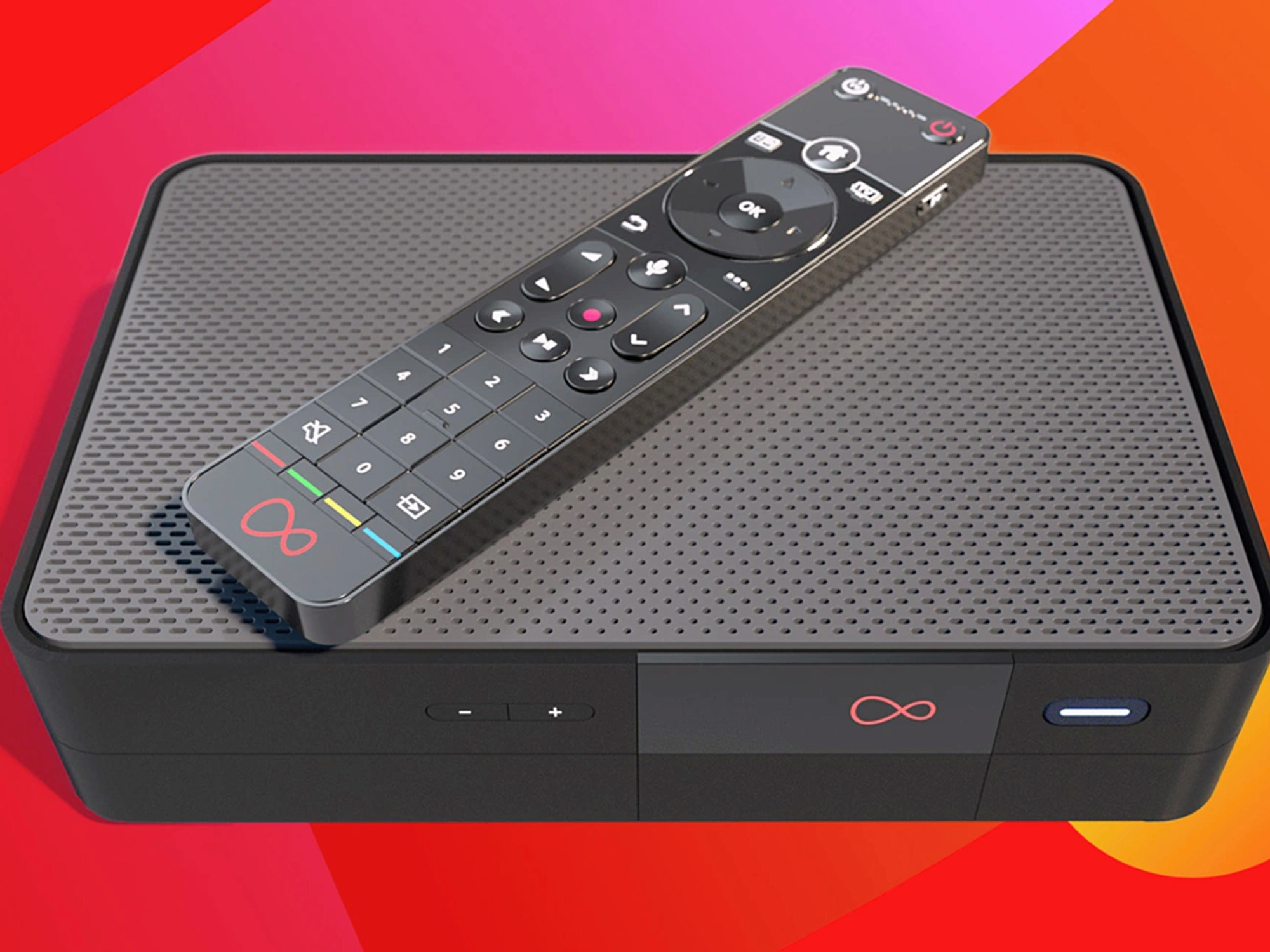 virgin media tv 360 box with a remote control lying on-top with a colourful swirling background