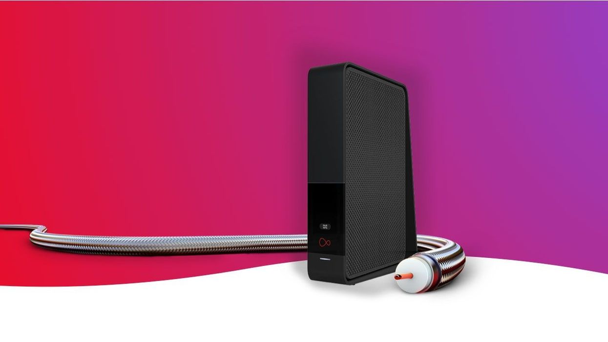 virgin media wi-fi router pictured with cable snaking around it on a colourful background