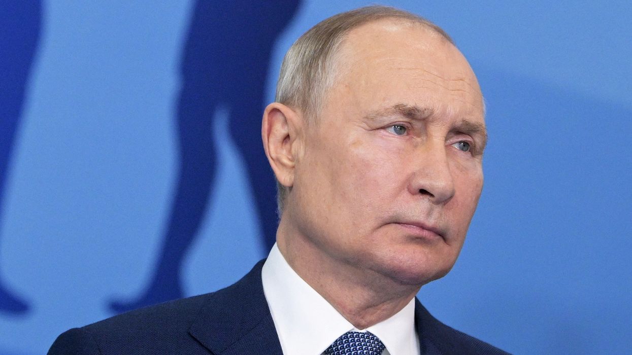 Vladimir Putin attends a ceremony via video link to open sports facilities in Perm, Russia