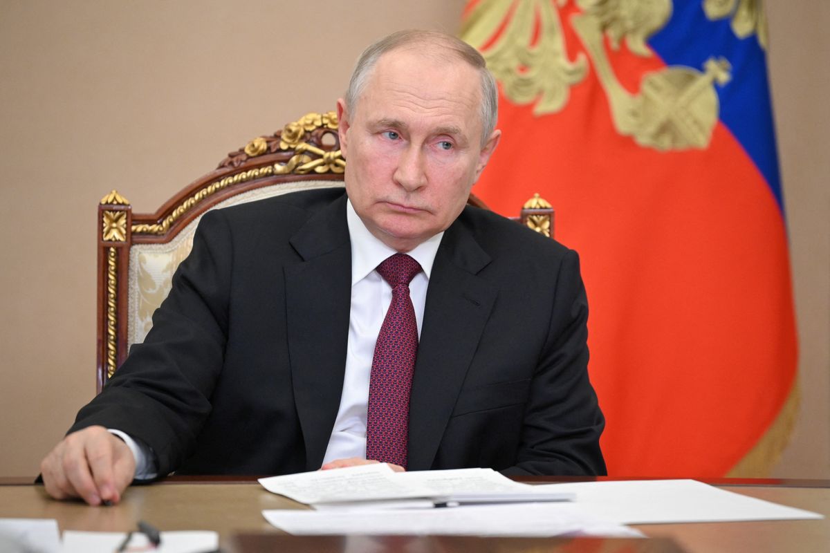  Vladimir Putin chairing a meeting in Moscow