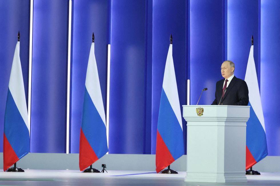 Vladimir Putin giving a speech in Russia's parliament