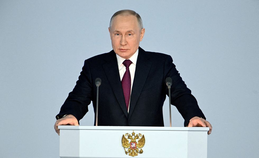 Vladimir Putin giving a speech