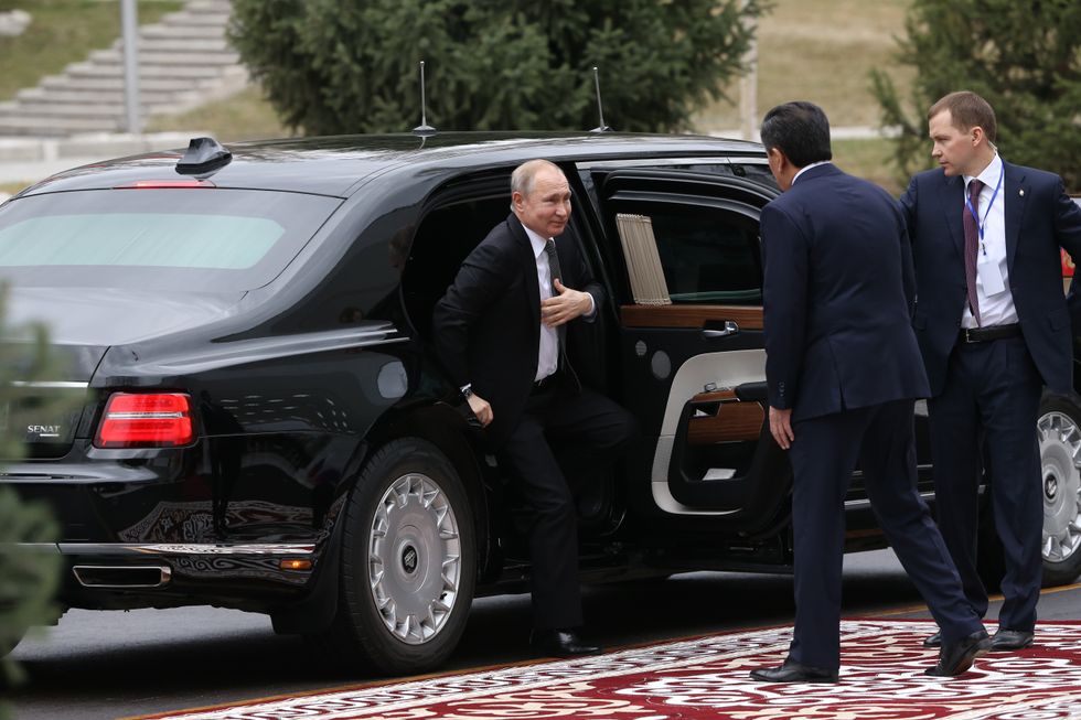 Vladimir Putin in an Aurus Senat