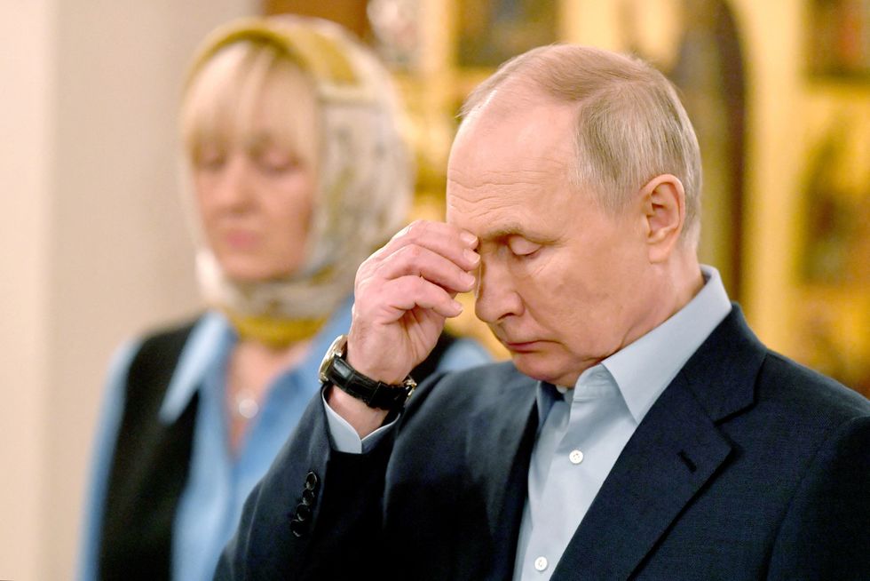 Vladimir Putin in church