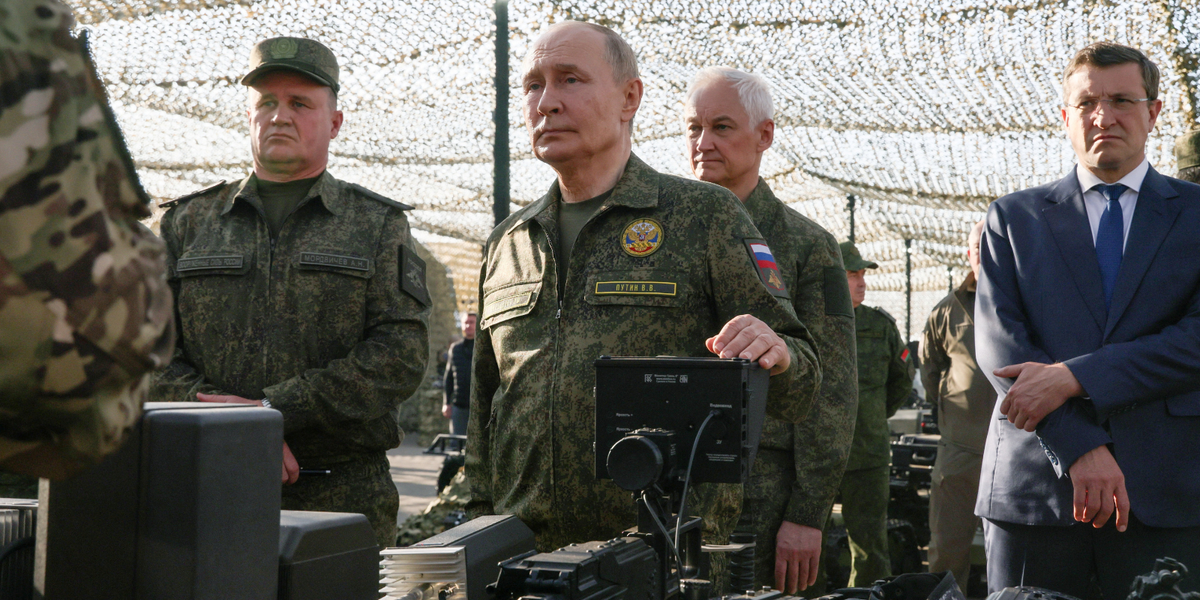 NextImg:Vladimir Putin dons military gear as nuclear drills on Nato's border reach climax