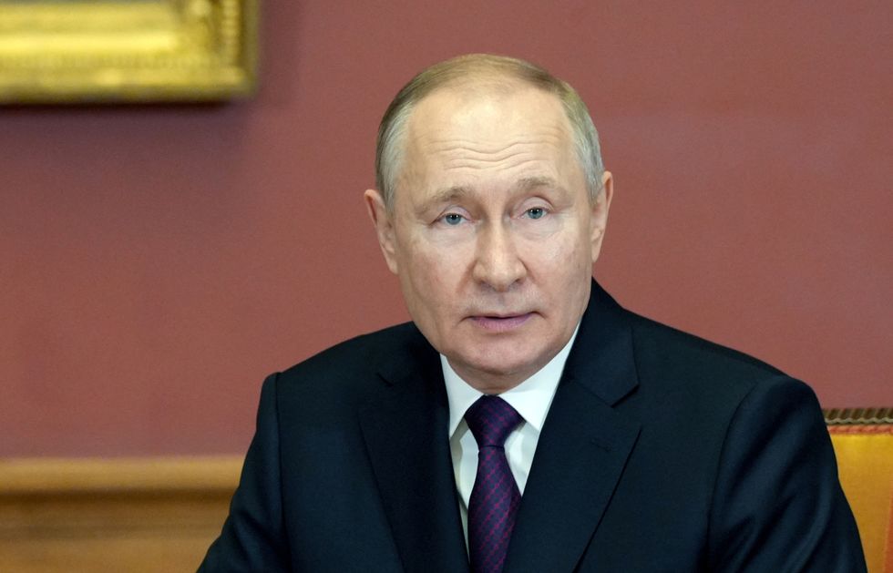 Vladimir Putin looked pale and tired in St Petersburg today amid claims he is suffering from multiple illnesses