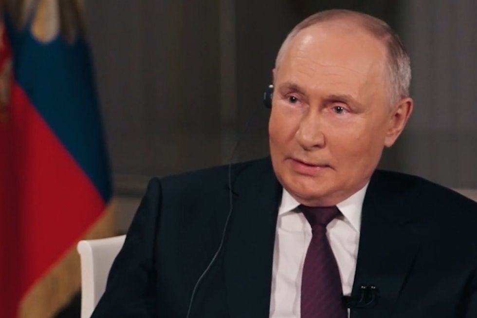 Vladimir Putin issues warning over Elon Musk as he sits down for ...